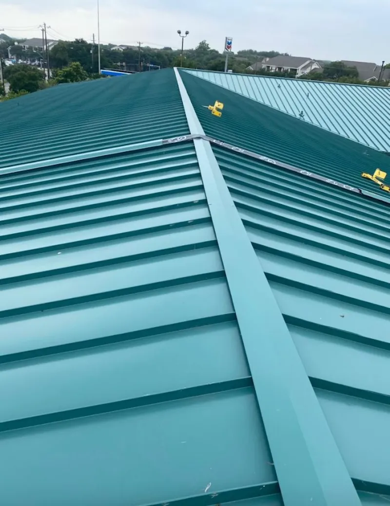 Green commercial metal roof ridge and valley for Metal Roof Repair in Sunrise